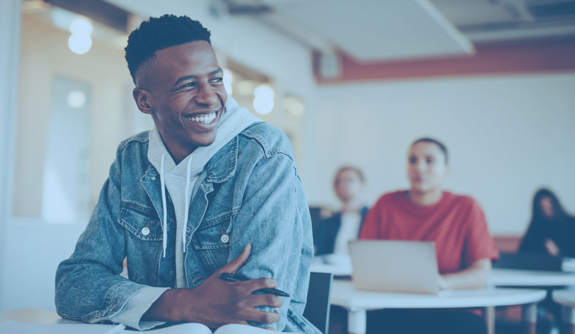 male student in classroom