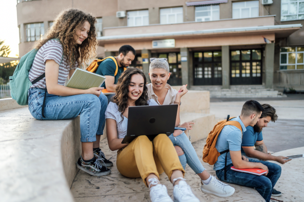 college students sitting outside